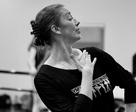 Ballet instructor demonstrating port de bras